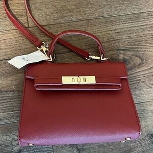 Francesca’s small/mini handbag never used